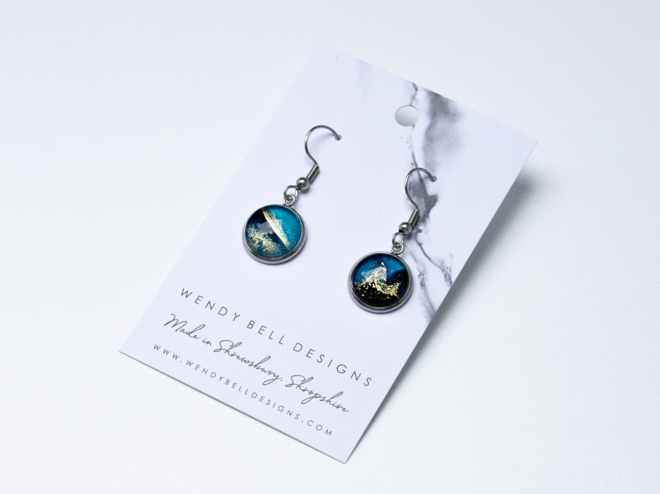 Hypoallergenic drop earrings containing unique alcohol ink art